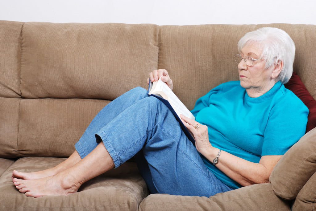 Senior reading a book