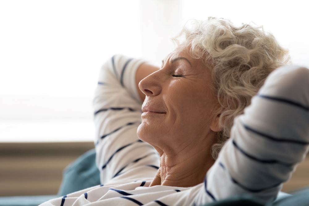 A senior resting or being mindful