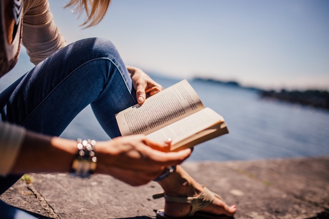 Reading a book in the sun