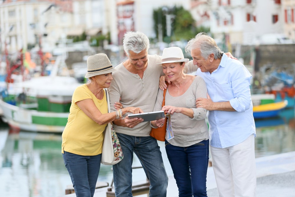 A group of seniors looking at a map