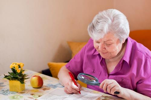 Senior doing puzzles