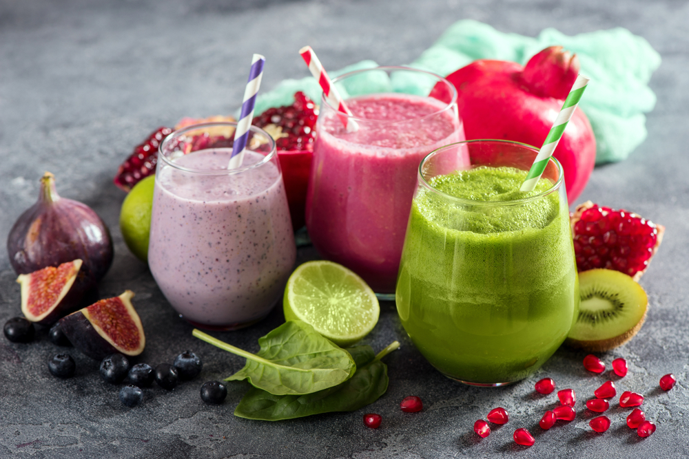 Three glasses of fruit smoothie