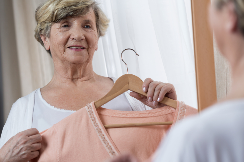 Senior woman with clothing, highlighting how assistive products can be powerful. 