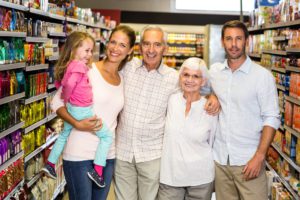 A multigenerational family in a grocery store