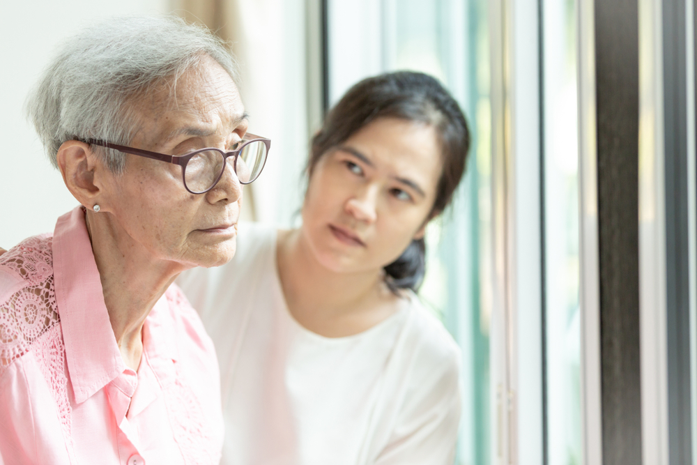 An Asian senior with her daughter who is also a caregiver, who thinks that my mom is lonely