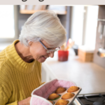 A senior woman baking muffins or something similar