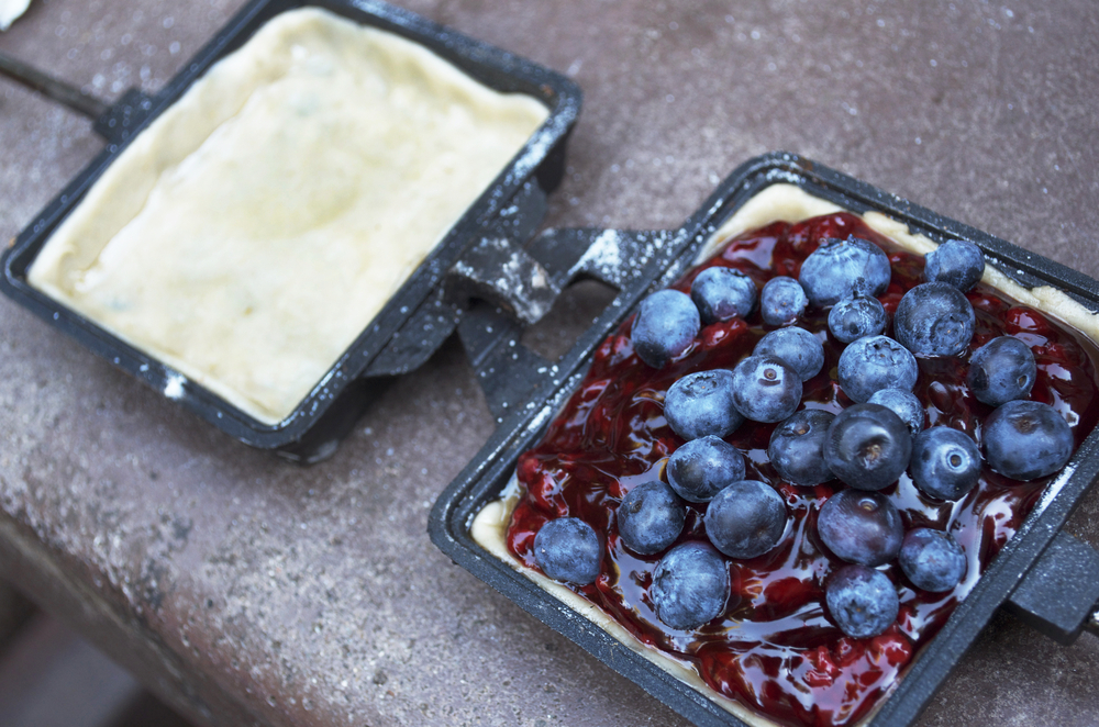 Dessert being made in a pie iron