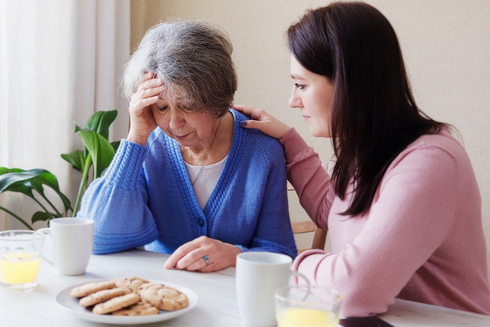 Talking to an elderly mother about a diagnosis, highlighting why we need to have tough conversations with aging parents