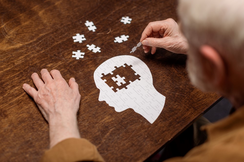 A man doing a puzzle, highlighting the idea of dementia