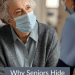 A senior woman wearing a mask talking to a caregiver or adult child