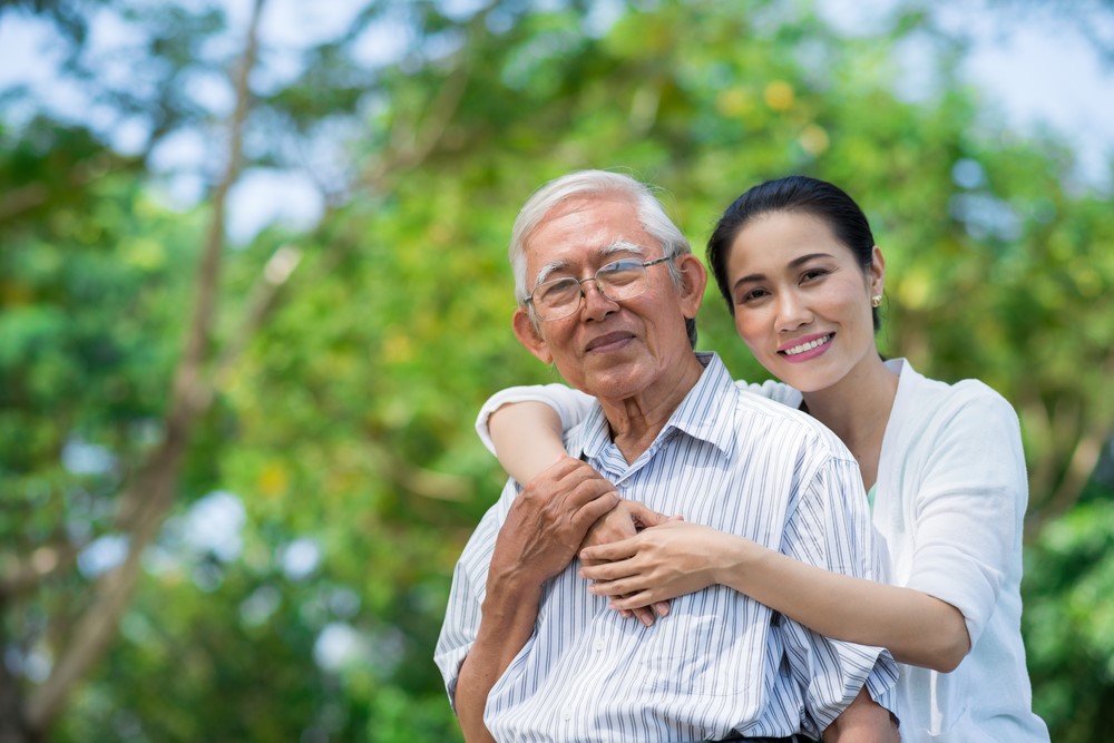 A Vietnamese woman with her father or grandfather