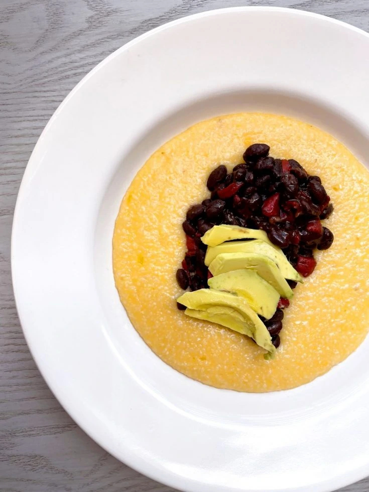 Vegetarian Cheddar Cheese Grits with Black Beans and Avocado from Return to the Kitchen