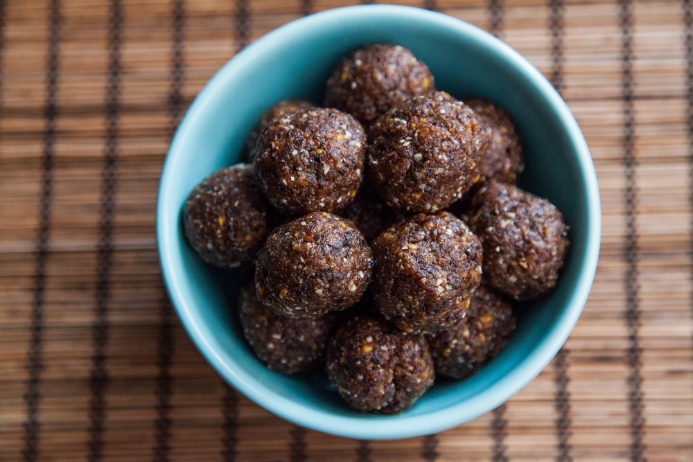 A blue bowl with protein laddus