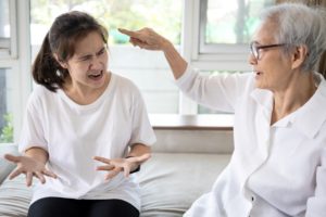 A daughter and mother in the midst of an argument, highlighting the idea that my mother lives with me and i hate it