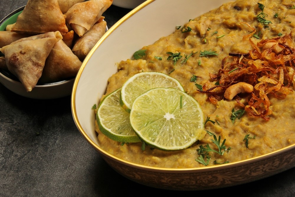 A plate containing a dish called haleem