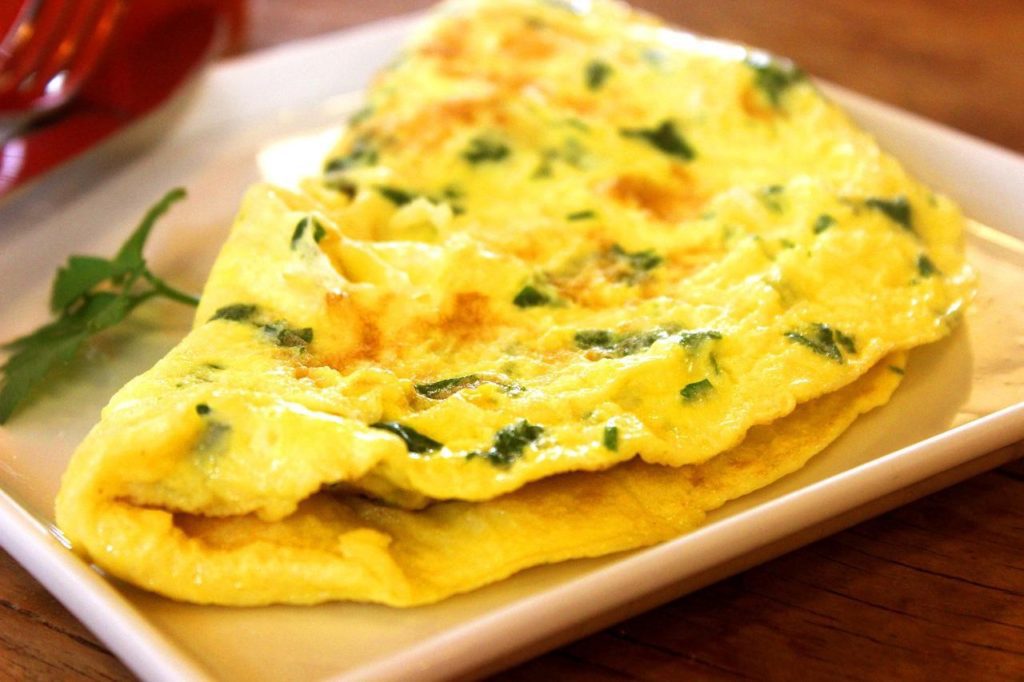 An omelet on a white plate