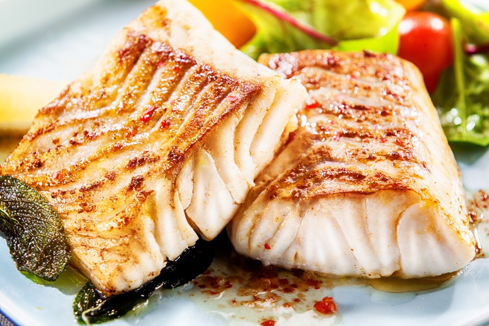 Baked white fish on a plate