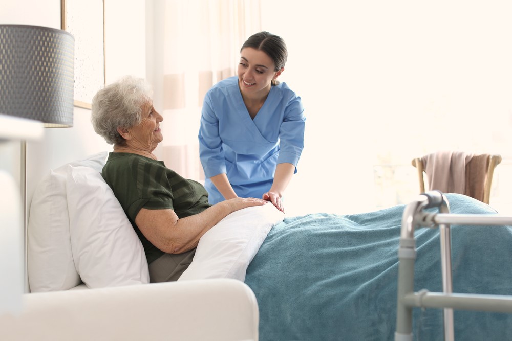 A woman and a caregiver, as part of hospice