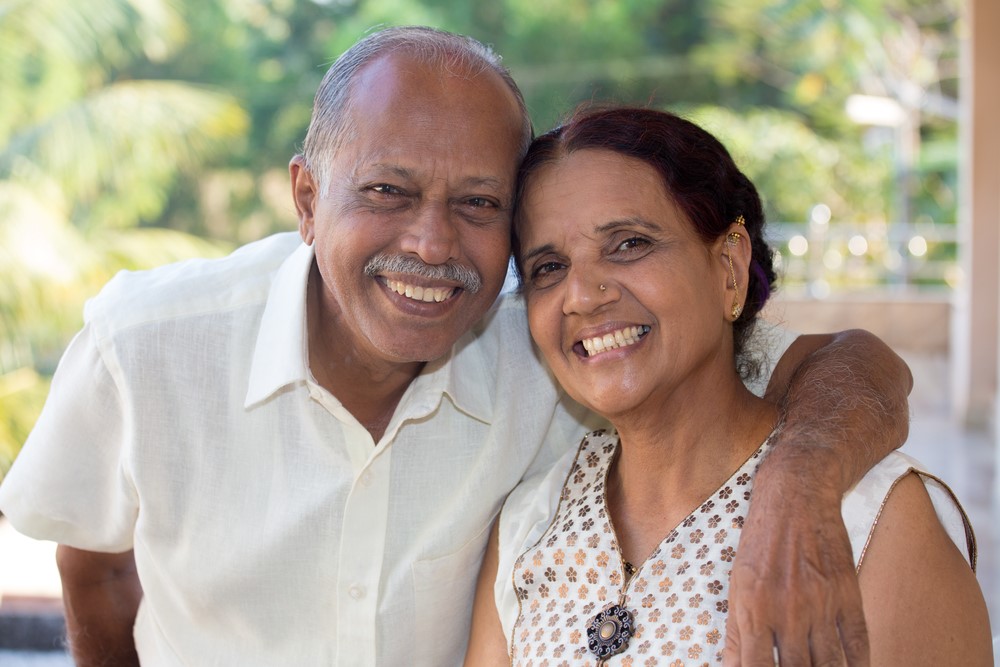 A Hispanic senior and his daughter