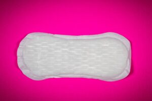 An incontinence pad or panty liner, highlighting the idea of bladder pads vs period pads