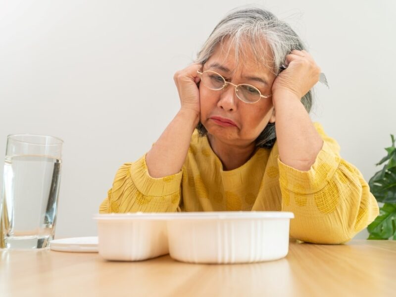 An aging woman who doesn't want to eat, highlighting the idea of tough love with elderly parents