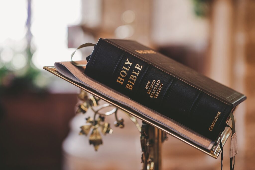 A Bible on a stand, highlighting the idea of caregiving with God