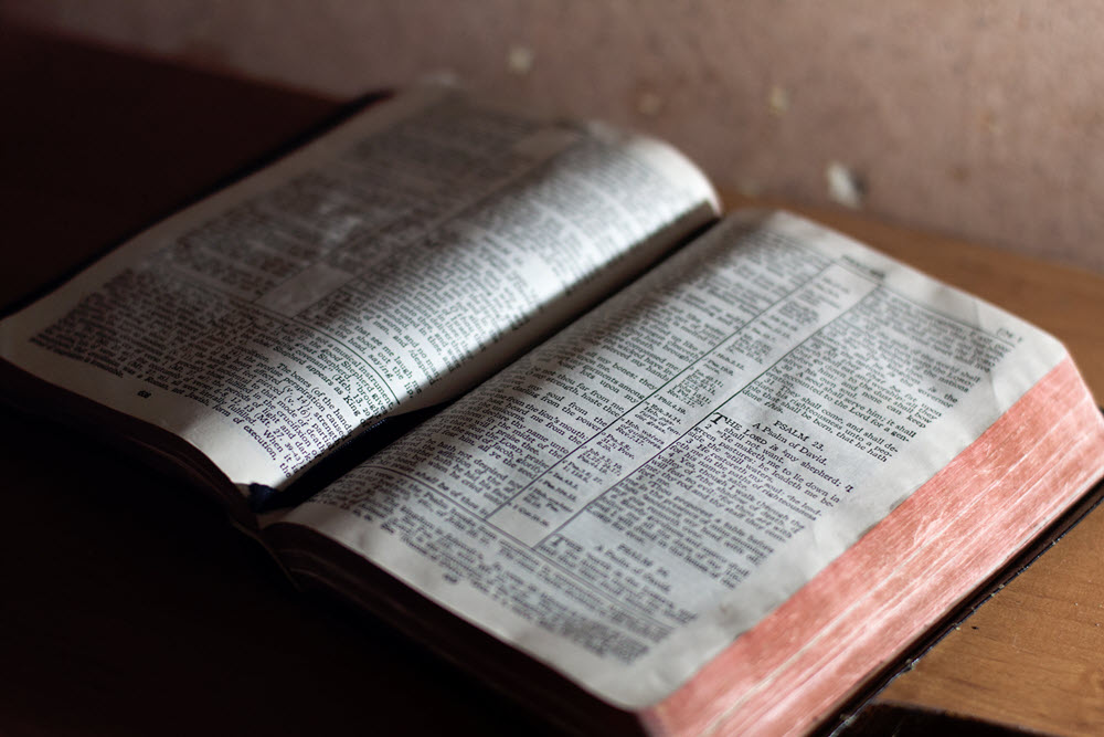 An open Bible on a table