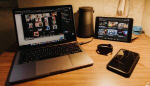 A laptop, tablet, and a phone, highlighting the idea of video calling devices for seniors