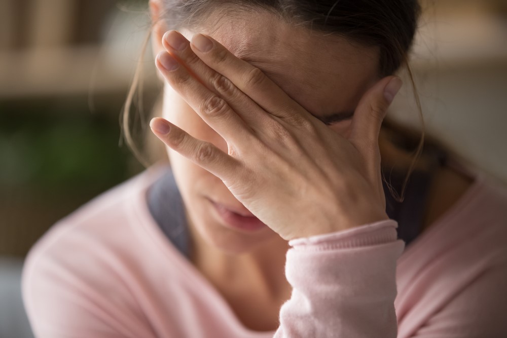 A young woman who is highly stressed