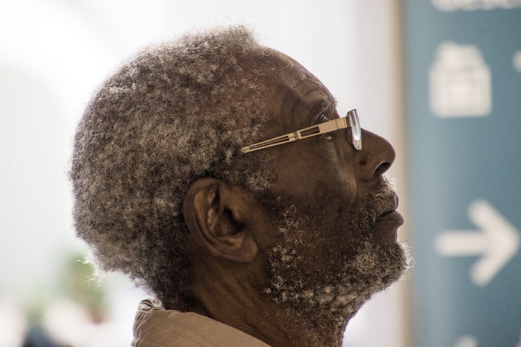 An older black man who may have cognitive impairment, highlighting the topic of how to support an aging parent with dementia