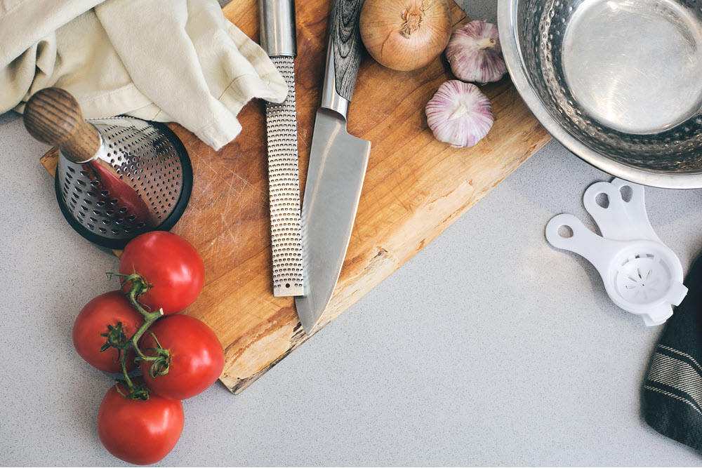 Ingredients and kitchen tools, highlighting the question of how to feed seniors and how to support them well.