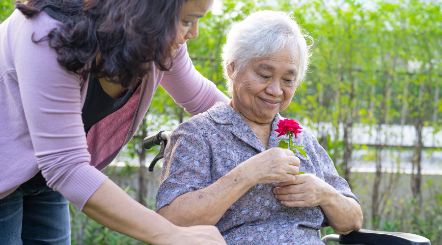 A caregiving daughter being compassionate