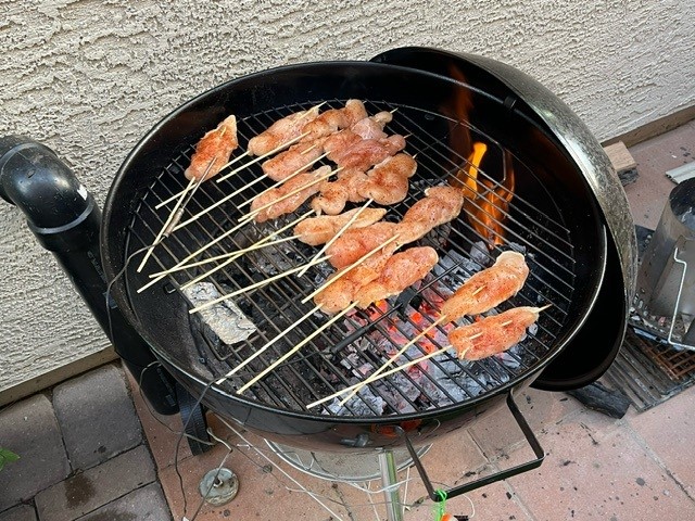 Chicken cooking on a grill