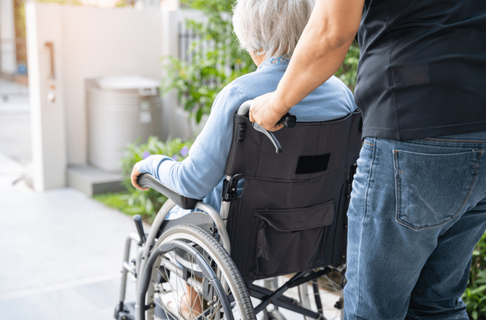 Wheeling an aging parent in a wheelchair