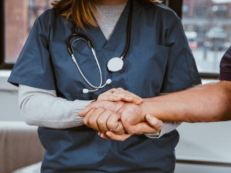 A nurse helping a patient with advance care planning